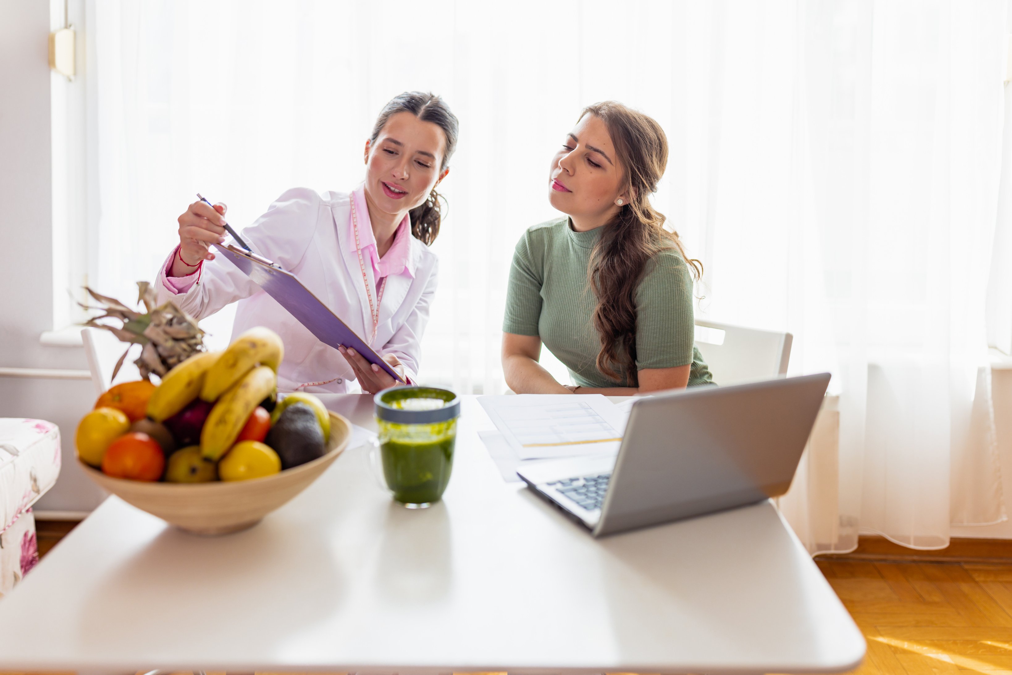 Dietician in Clinic Discussing Nutrition for Healthier Living